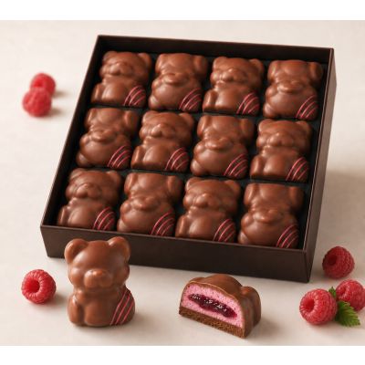 Raspberry marshmallow and almond praline teddy bears with milk chocolate coating