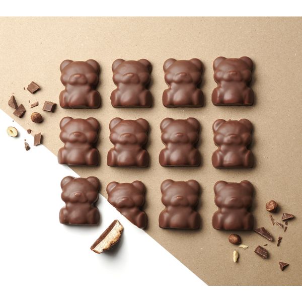 Box of vanilla marshmallow and hazelnut praline teddy bears with a milk coating