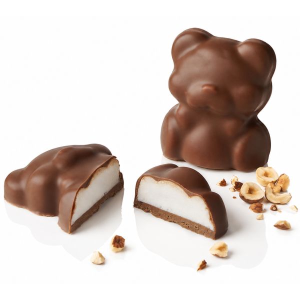 Box of vanilla marshmallow and hazelnut praline teddy bears with a milk coating