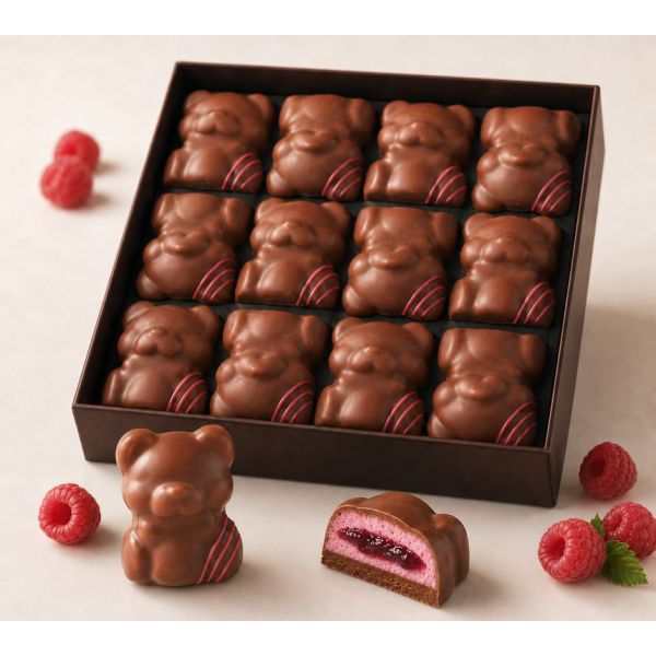 Raspberry marshmallow and almond praline teddy bears with milk chocolate coating